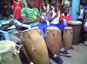 Children in Accra playing Ewe drums