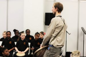 Laurence performing with AMS pupils at Music Expo 2017
